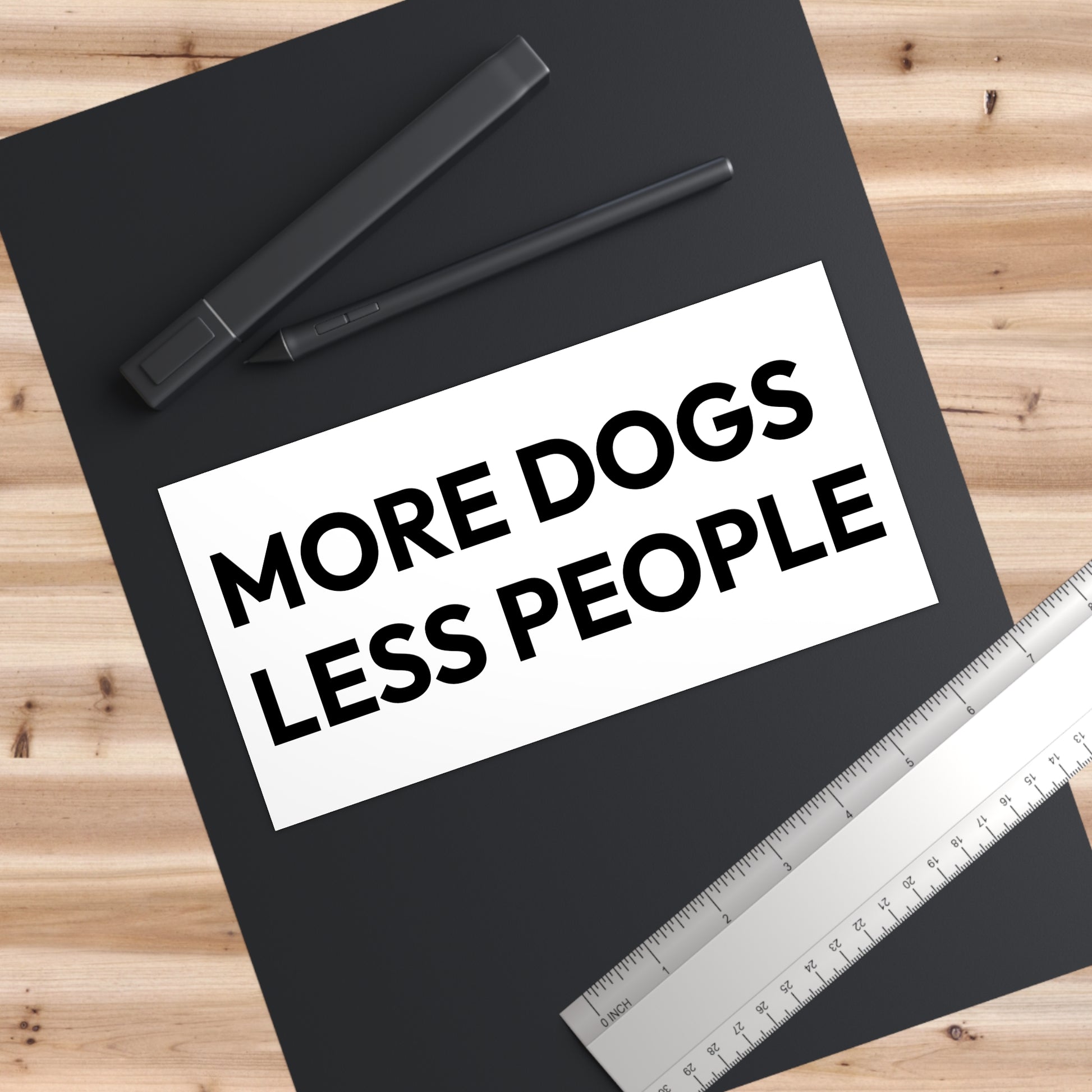 "More Dogs Less People" Bumper Sticker