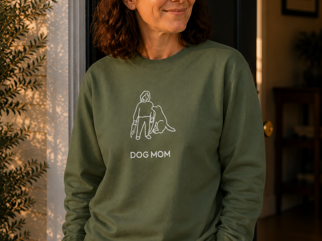 Dog Mom sweatshirt featuring a woman standing beside her dog