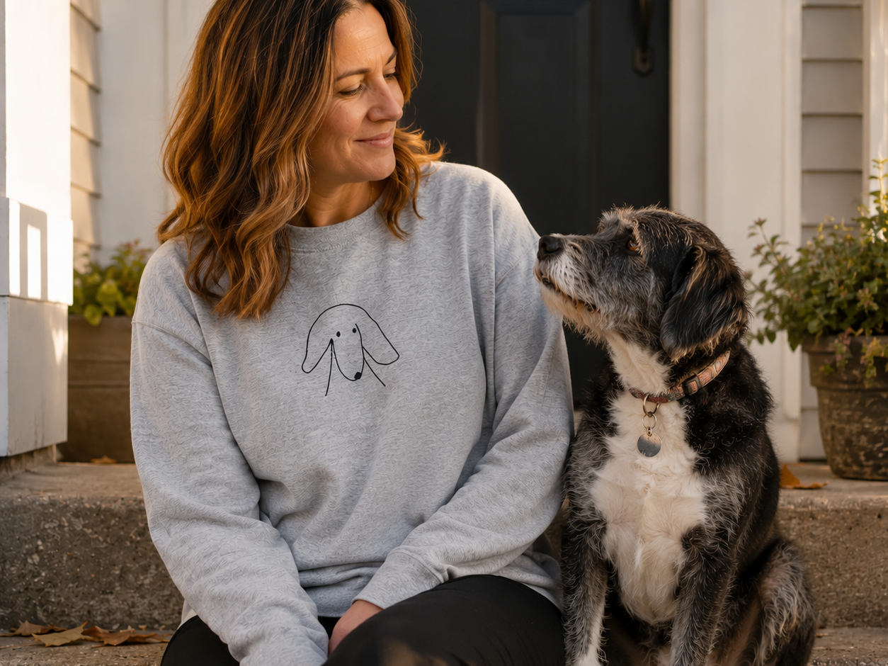 Sideways Glance embroidered sweatshirt featuring a dog glancing sideways in profile
