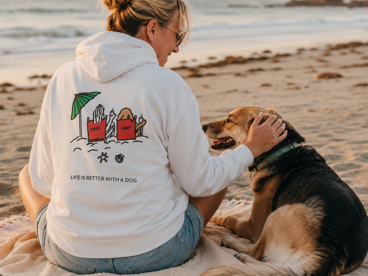 Dog Beach color collection hoodie featuring a person and dog in beach chairs spelling More Woof